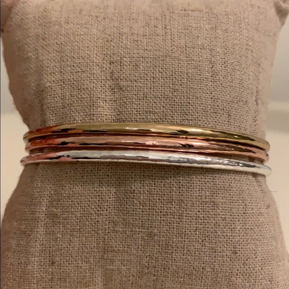 Unworn. Mixed metal trio.